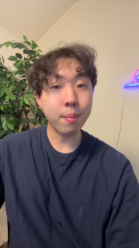 Bryan Chen speaking to camera